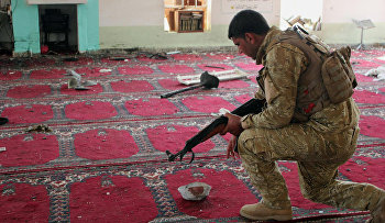 An Iraqi army soldier inspects the damage inside the Abu Bakr Mosque in Baqouba, northeast of Baghdad, Iraq