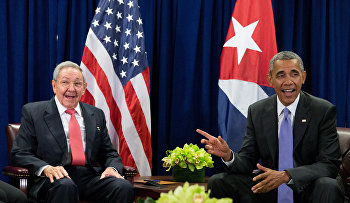 President Barack Obama and Cuban President Raul Castro sit together for members of the media before a bilateral meeting, Tuesday, Sept. 29, 2015, at the United Nations headquarters