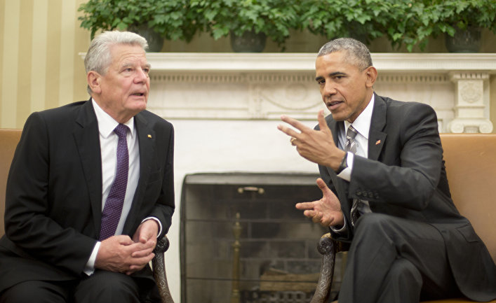 President Barack Obama meets with German President Joachim Gauck in the Oval Office of the White House in Washington, Wednesday, Oct. 7