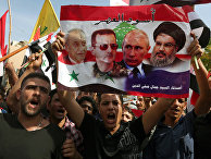 Syrians who live in Lebanon chant slogans during a rally to thank Moscow for its intervention in Syria