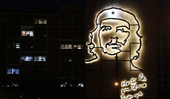 Some office lights are left on at the Ministry of Interior, decorated with an iron sculpture of Cuba's revolutionary hero Ernesto "Che" Guevara at Revolution Square in Havana, Cuba