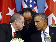 Turkish President Recep Tayyip Erdogan, left, talks with U.S. President Barack Obama, right, during a session of the G-20 Summit in Antalya, Turkey