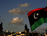 Libyans watch the protest against Ansar al-Shariah Brigades and other Islamic militias, in Benghazi, Libya