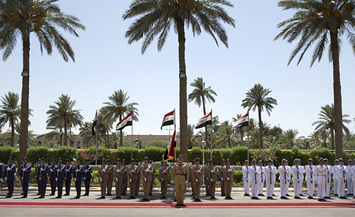 An honor guard is positioned for the arrival of U.S. Defense Secretary Ash Carter to the Ministry of Defense in Baghdad, Iraq, Thursday, July 23, 2015