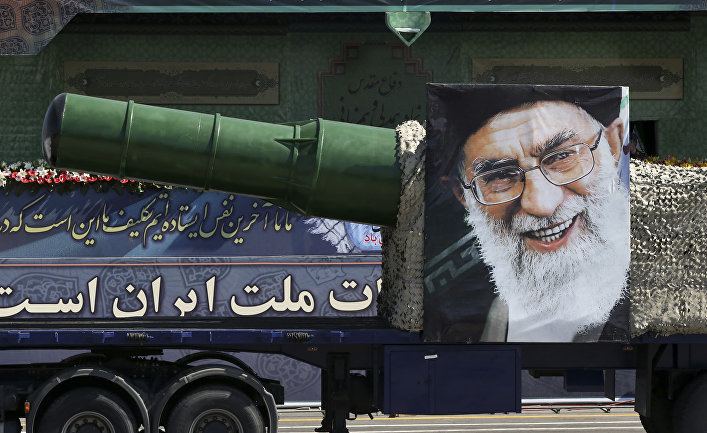 A portrait of the Iranian supreme leader Ayatollah Ali Khamenei is placed on a truck with a military hardware driven in a parade marking the 35th anniversary of Iraq's 1980 invasion of Iran