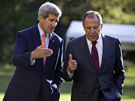 U.S. Secretary of State John Kerry, left, and Russian Foreign Minister Sergey Lavrov talk as they walk together on the grounds of the Chief of Mission Residence in Paris, France, Tuesday, Oct. 14, 2014