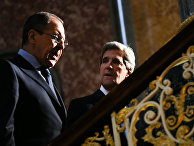 US Secretary of Sate John Kerry chats with Russia's Sergey Lavrov, left, at the G8 Foreign Ministers meeting at Lancaster House Thursday April 11, 2013 in London, England